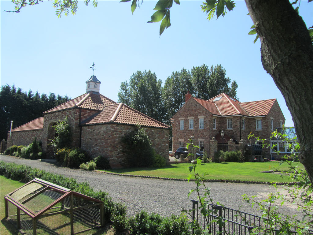 A replacement rural dwelling sits adjoining a grouping of stables to create an attractive group composition! Gallery Image