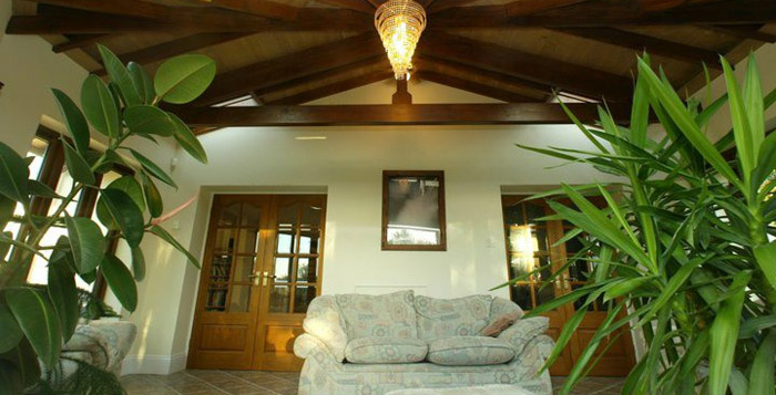 Sharing the sun lounge with your tropical plants creates a restful room for relaxation Gallery Image