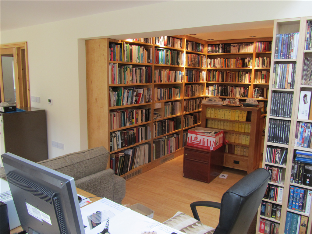 This dwelling incorporates a library as an enclave within the home study! Gallery Image